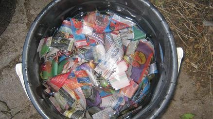 Soaked newspapers for worm bin bedding